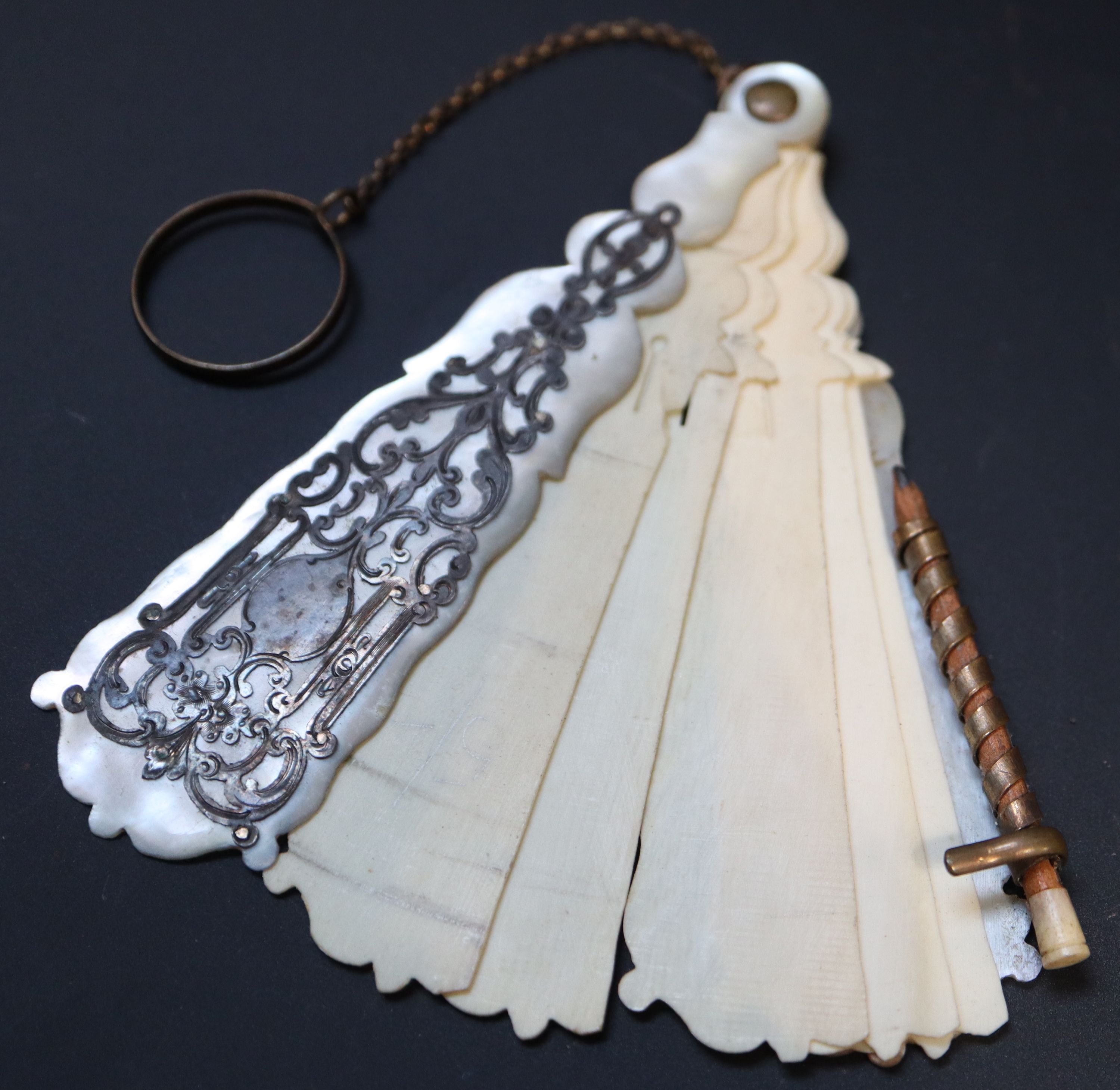 Six 19th century Palais Royale mother of pearl mounted dance cards and note cases largest 9cm